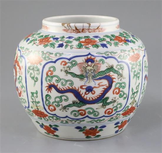 A Chinese wucai dragon jar, Qing dynasty, H. 16.5cm, repair to rim